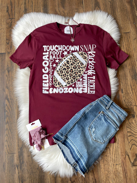 Leopard Football with Scattered Words Tee - Maroon